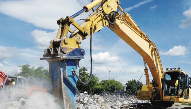 How Equipment Attachments for Pouring and Removing Pavement Boost Efficiency